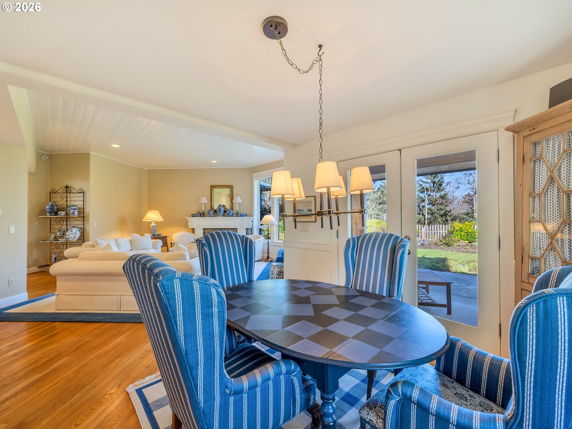 2537 Pine Ridge Drive Gearhart, OR 97138 - Photo 15 of 35 a view of a dining room with furniture window and wooden floor