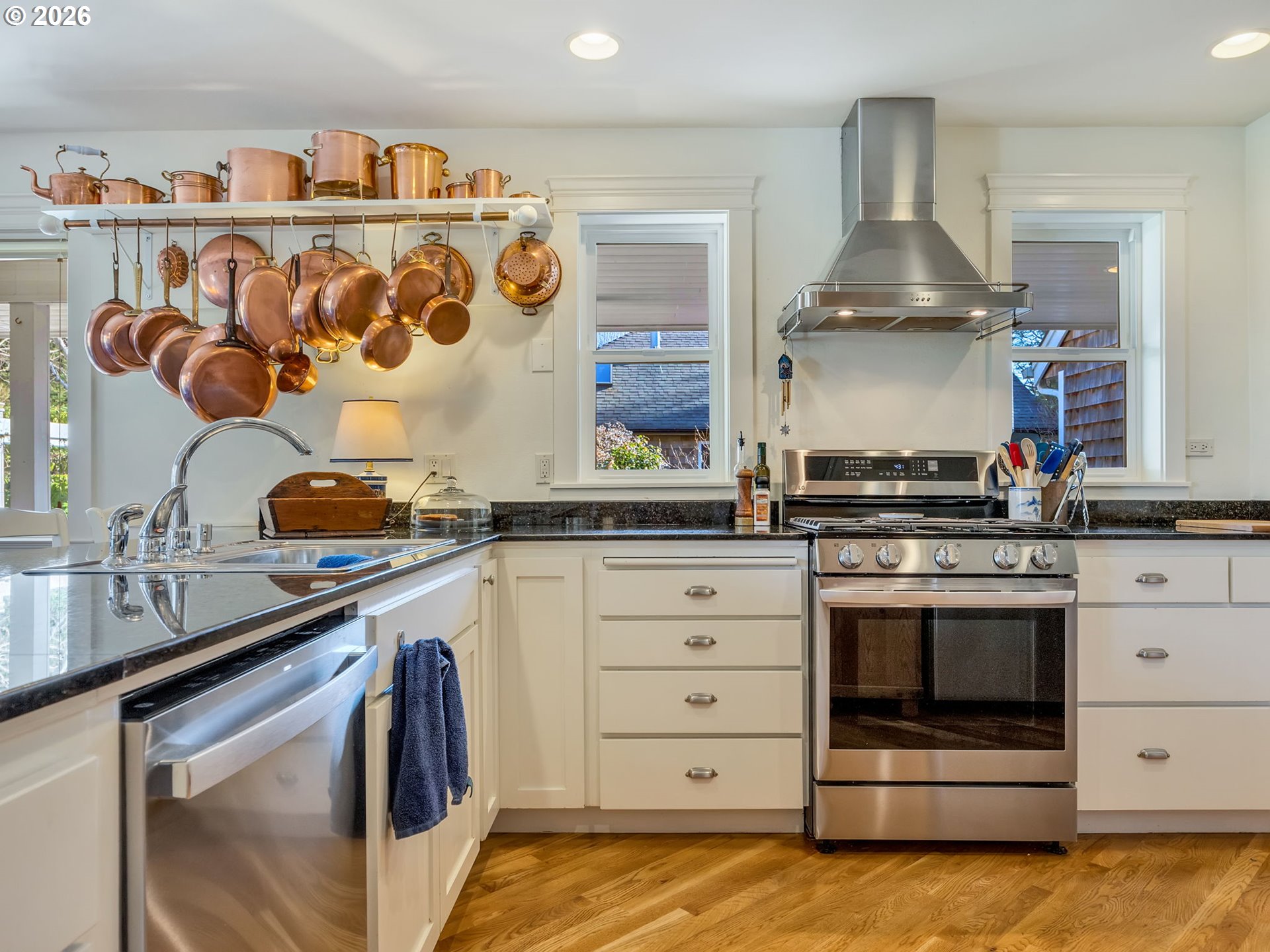2537 Pine Ridge Drive Gearhart, OR 97138 - Photo 18 of 35 a kitchen with stainless steel appliances granite countertop a sink and a stove