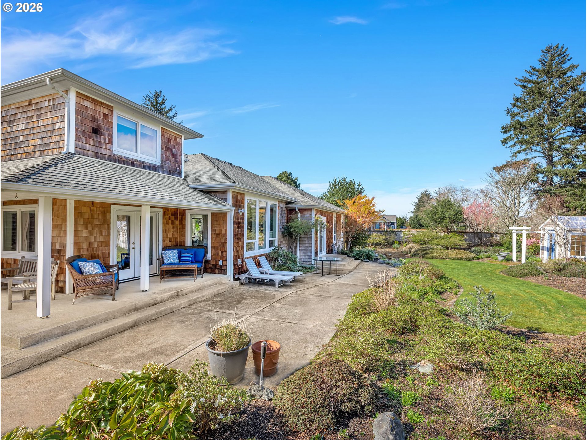 2537 Pine Ridge Drive Gearhart, OR 97138 - Photo 3 of 35 a front view of a house with garden