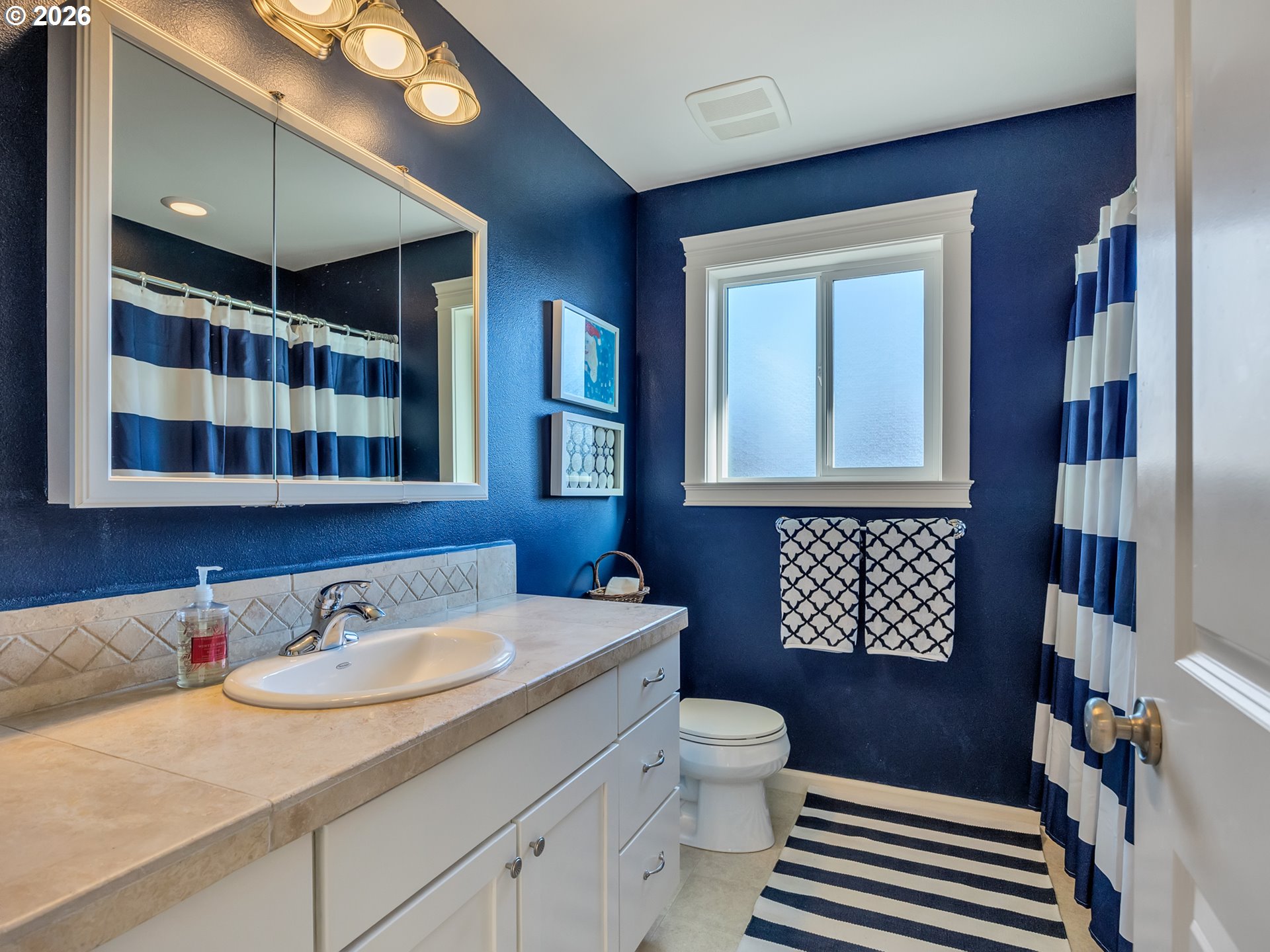 2537 Pine Ridge Drive Gearhart, OR 97138 - Photo 34 of 35 a bathroom with a sink a toilet and shower