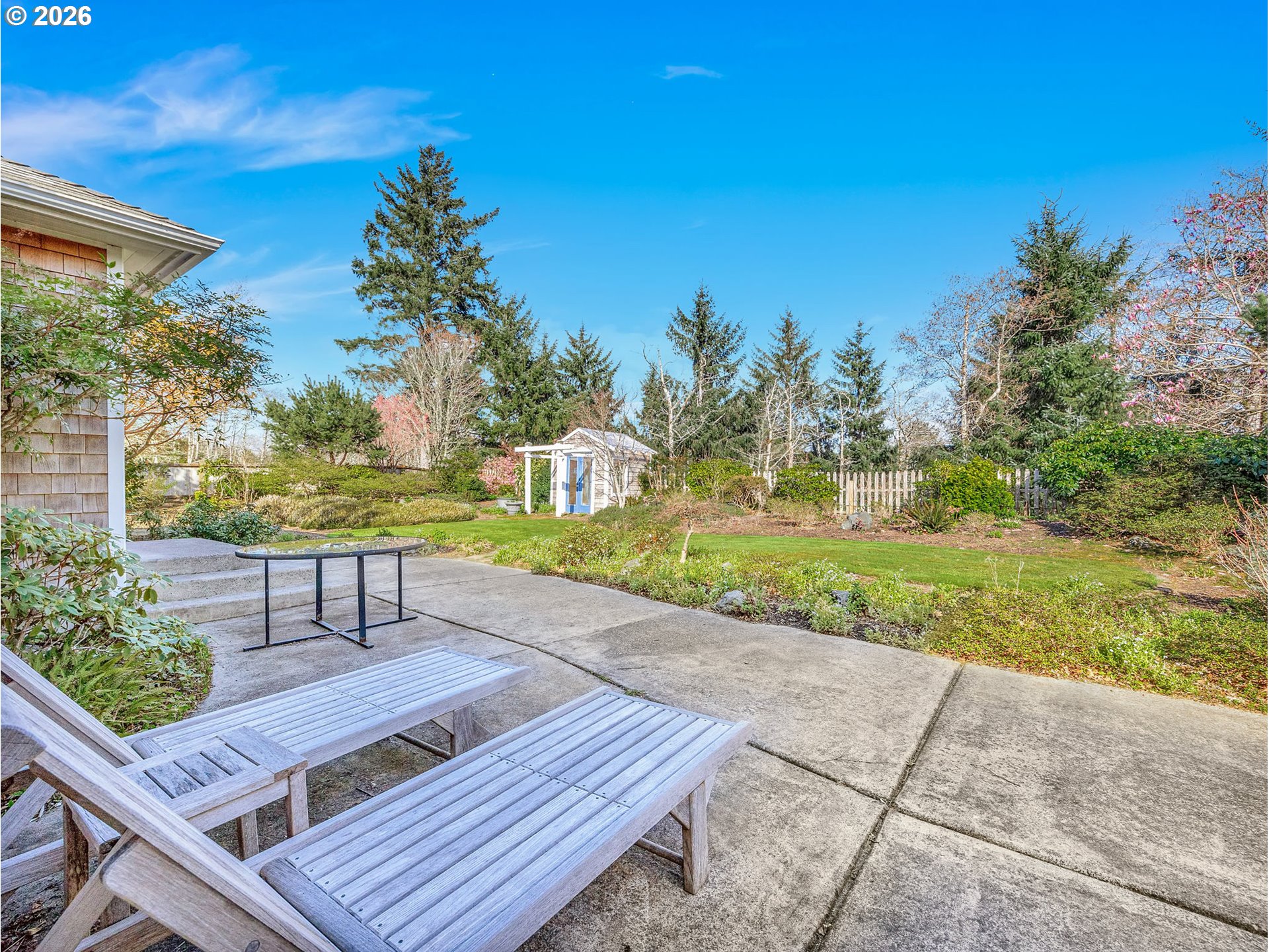 2537 Pine Ridge Drive Gearhart, OR 97138 - Photo 5 of 35 a view of a wooden floor with a bench in a patio