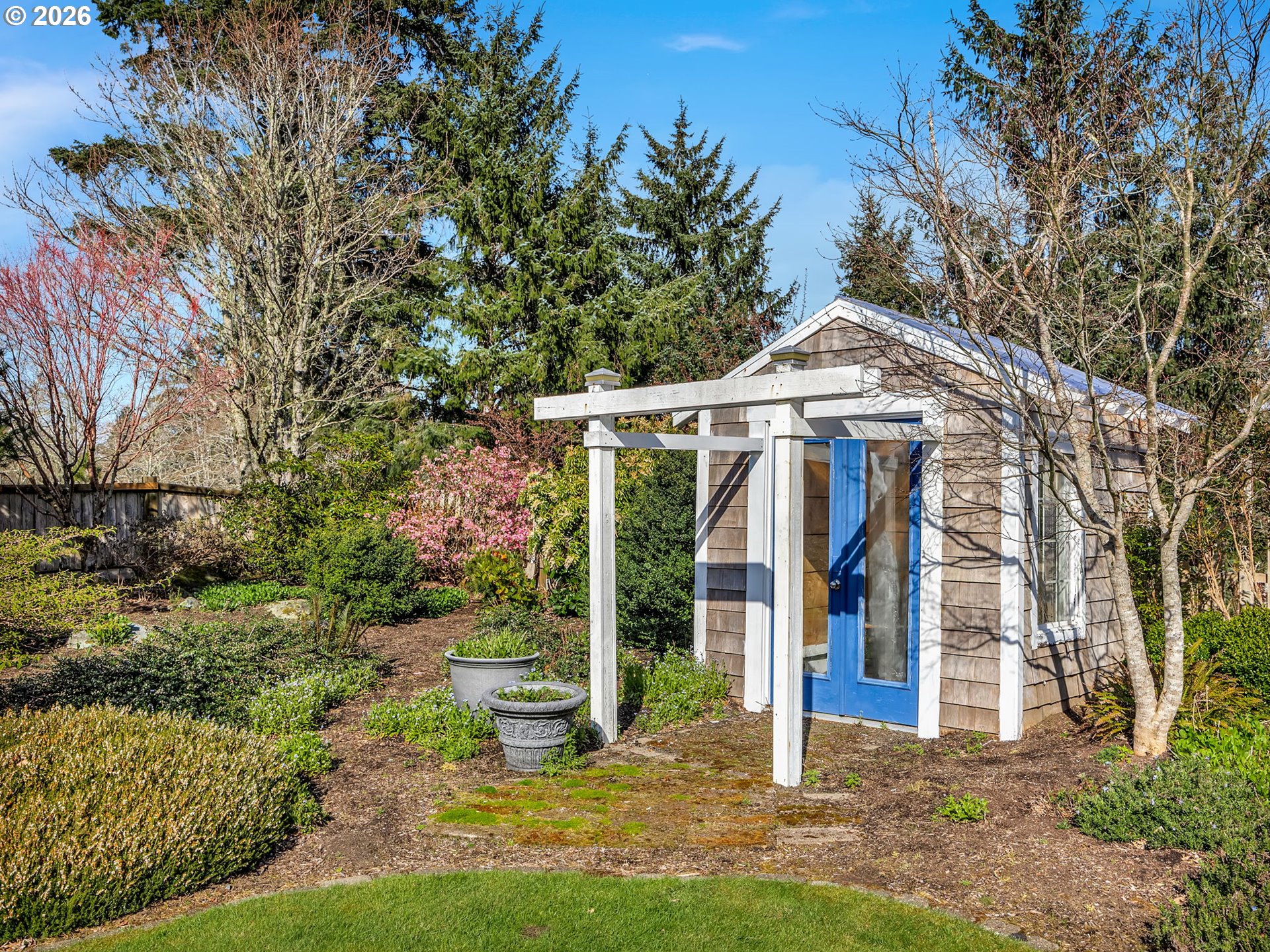 2537 Pine Ridge Drive Gearhart, OR 97138 - Photo 7 of 35 a view of a wooden house with a yard