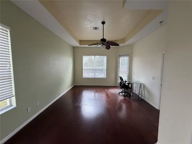 a view of dining room with hardwood floor