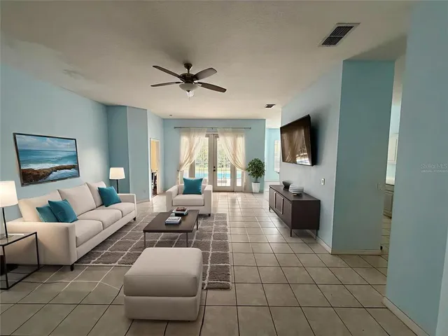 a view of an empty room with a window