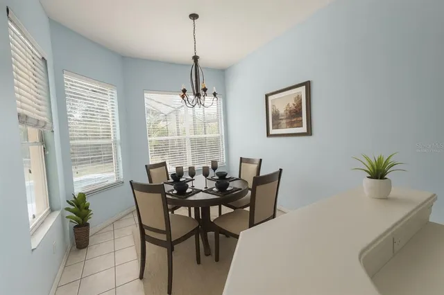 a view of an empty room with windows