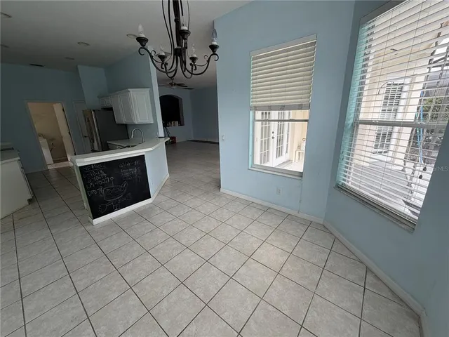 a kitchen with a sink a stove and refrigerator