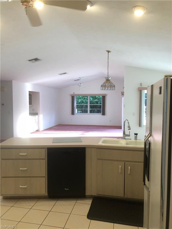 538 Roma Court Naples, FL 34110 - Photo 6 of 19 a kitchen with a sink and cabinets