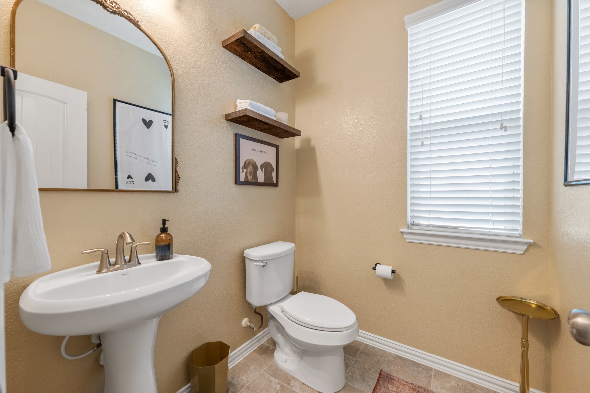 18312 Turning Stream Lane Pflugerville, TX 78660 - Photo 27 of 40 a bathroom with a sink mirror and toilet