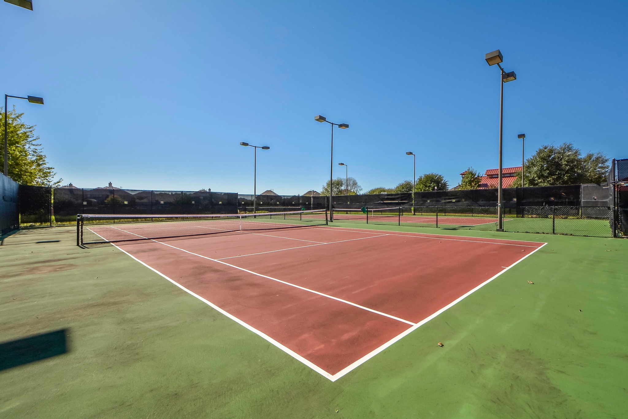 18312 Turning Stream Lane Pflugerville, TX 78660 - Photo 35 of 40 view of a tennis court