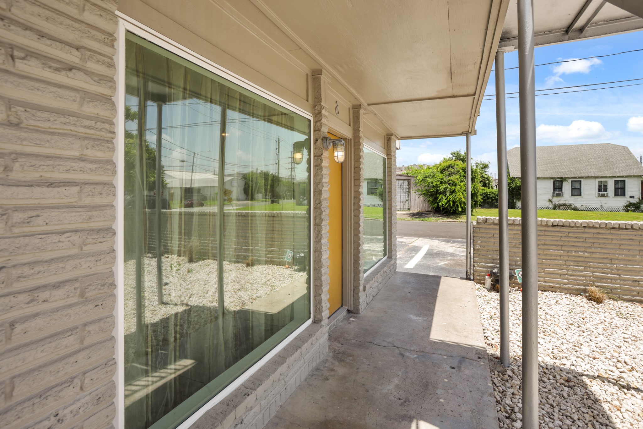1408 Hughes Street, Unit 4 Houston, TX 77023 - Photo 2 of 27 Large picture windows bring in abundant natural light.