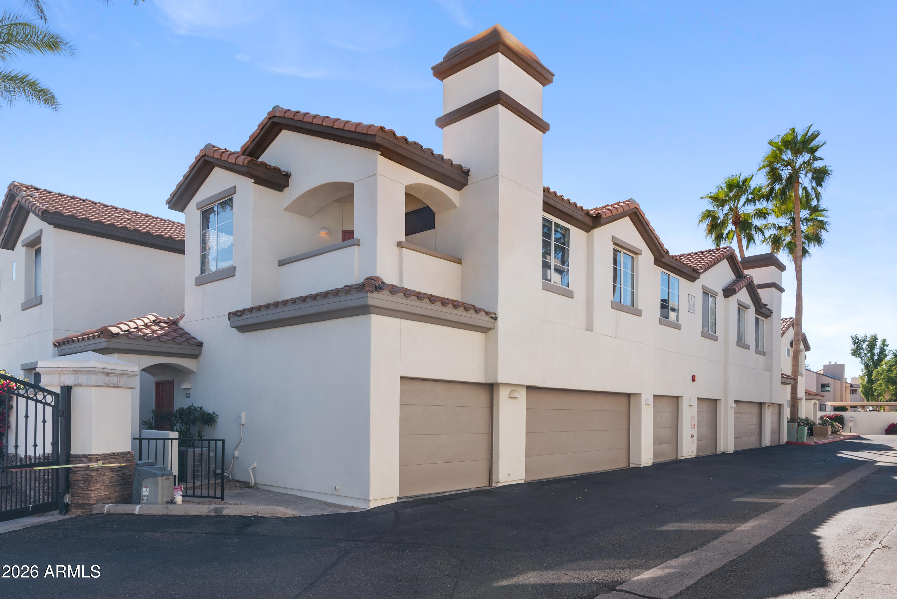 2992 North Miller Road, Unit A212 Scottsdale, AZ 85251 - Photo 1 of 25 Front Exterior with Attached Garage