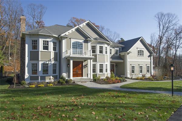 150 Princeton Road Brookline, MA 02467 - Photo 1 of 30 a front view of a house with a yard