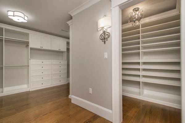 150 Princeton Road Brookline, MA 02467 - Photo 17 of 30 a view of walk in closet with empty racks
