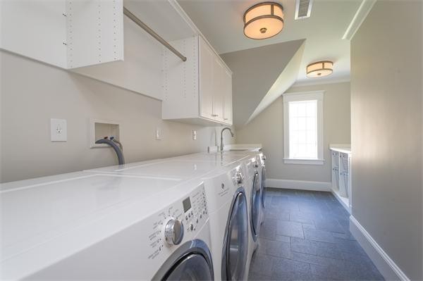 150 Princeton Road Brookline, MA 02467 - Photo 23 of 30 a utility room with dryer and washer