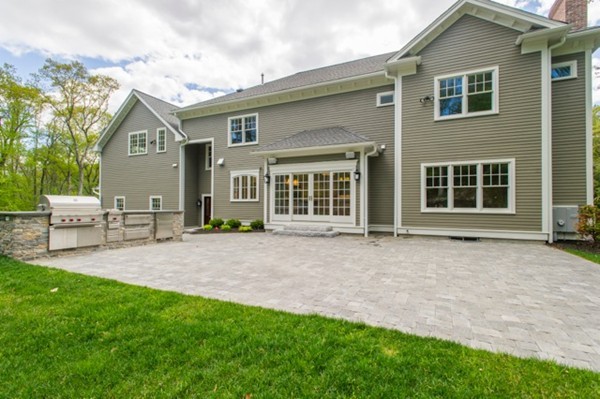 150 Princeton Road Brookline, MA 02467 - Photo 26 of 30 a view of a house with a yard and sitting area