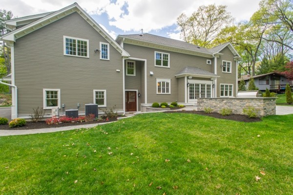 150 Princeton Road Brookline, MA 02467 - Photo 27 of 30 a house that has sitting area in backyard