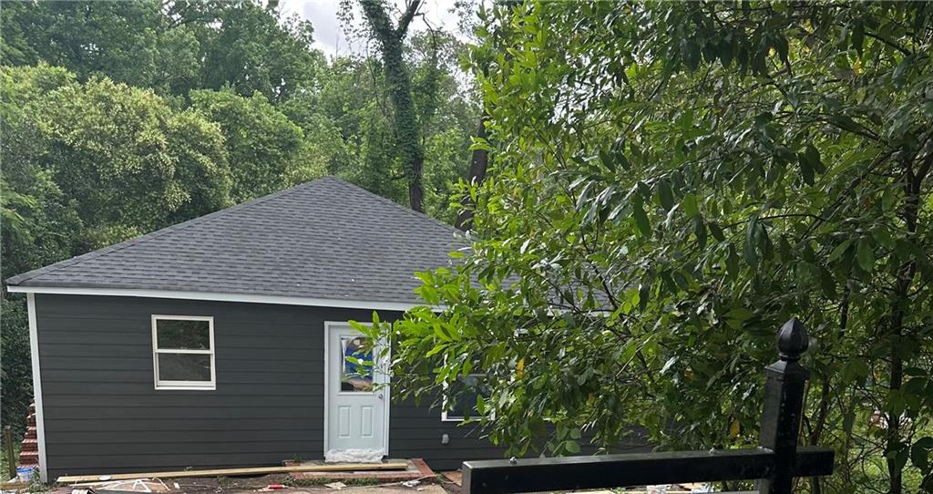 a backyard of a house with lots of green space