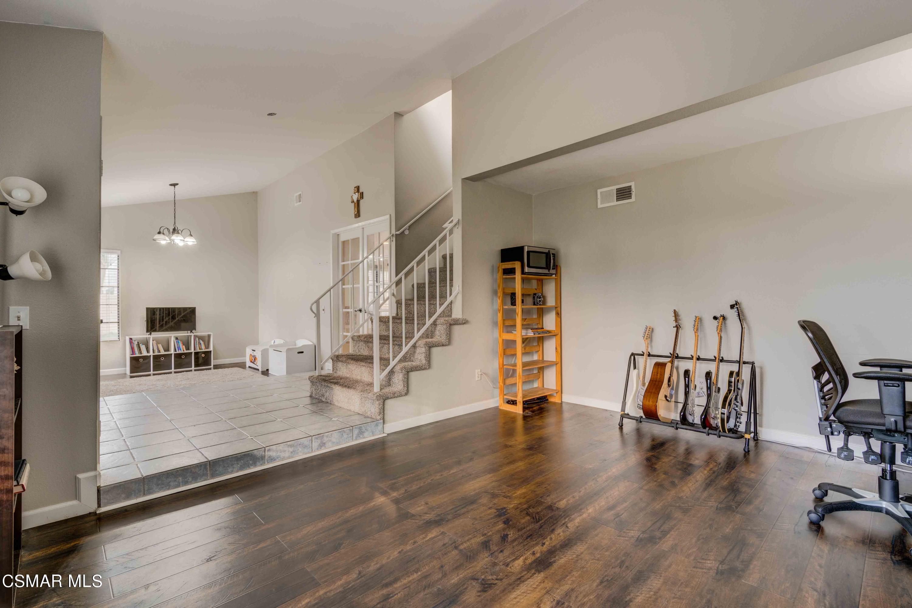 3620 Olds Road Oxnard, CA 93033 - Photo 11 of 34 an empty room with wooden floor and windows