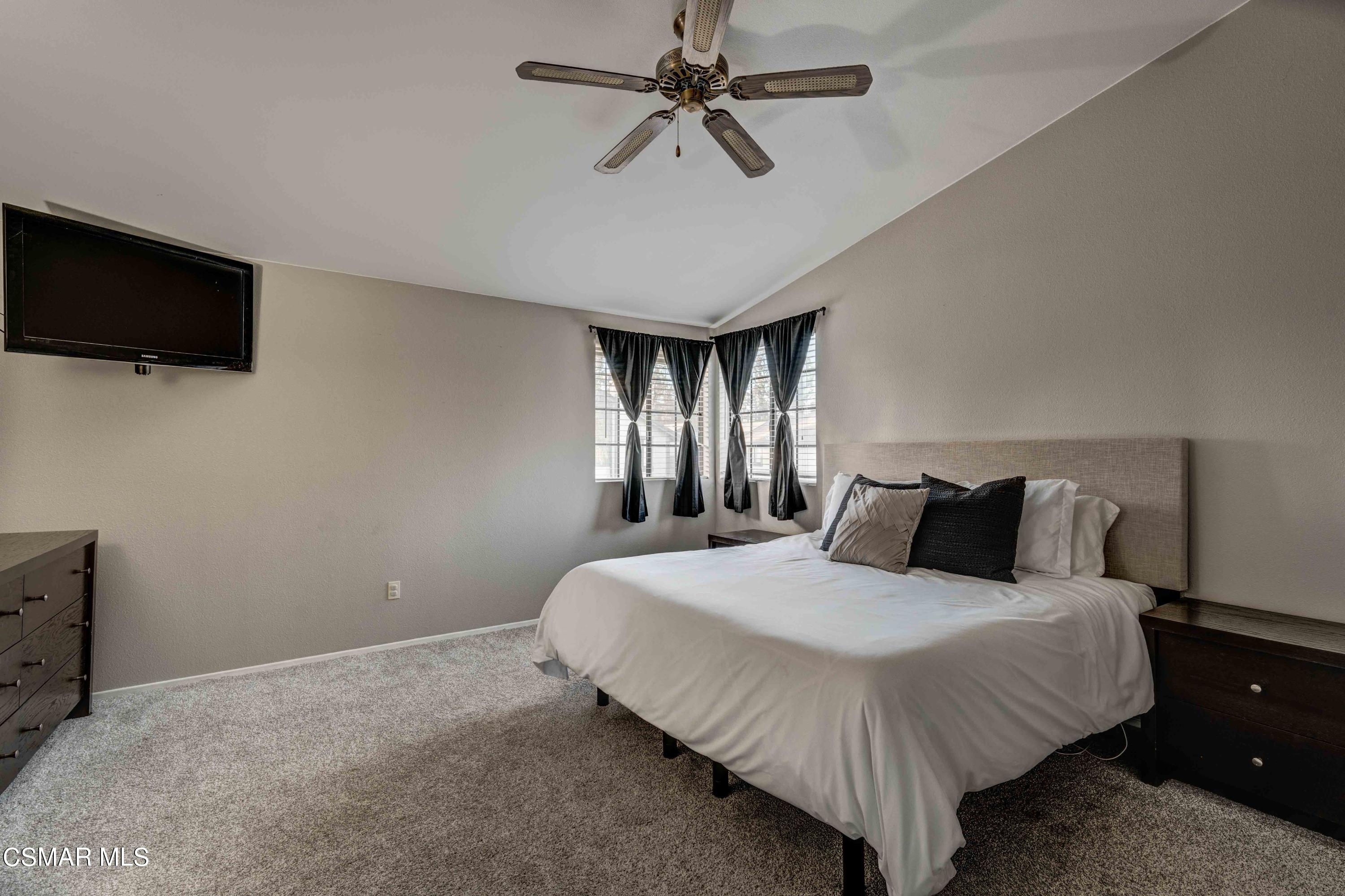 3620 Olds Road Oxnard, CA 93033 - Photo 16 of 34 a bedroom with a bed and a flat screen tv