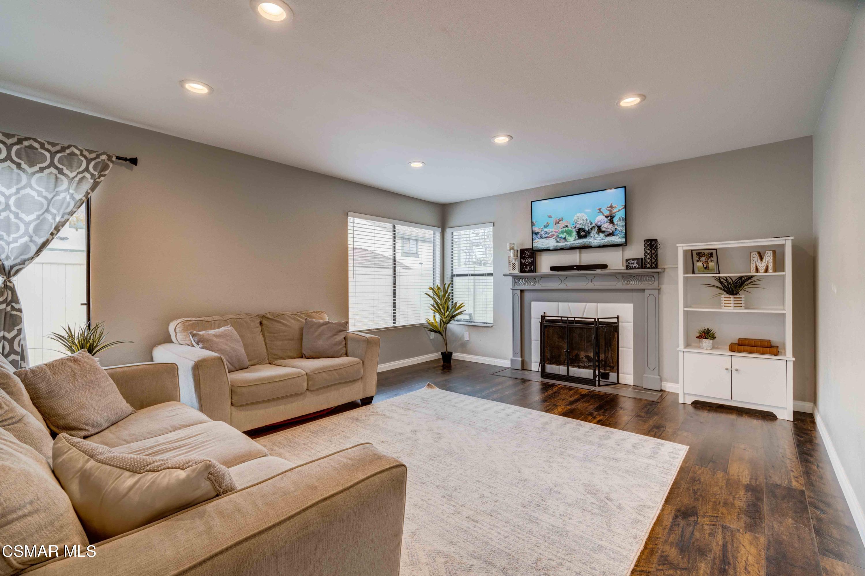 3620 Olds Road Oxnard, CA 93033 - Photo 7 of 34 a living room with furniture and a fireplace
