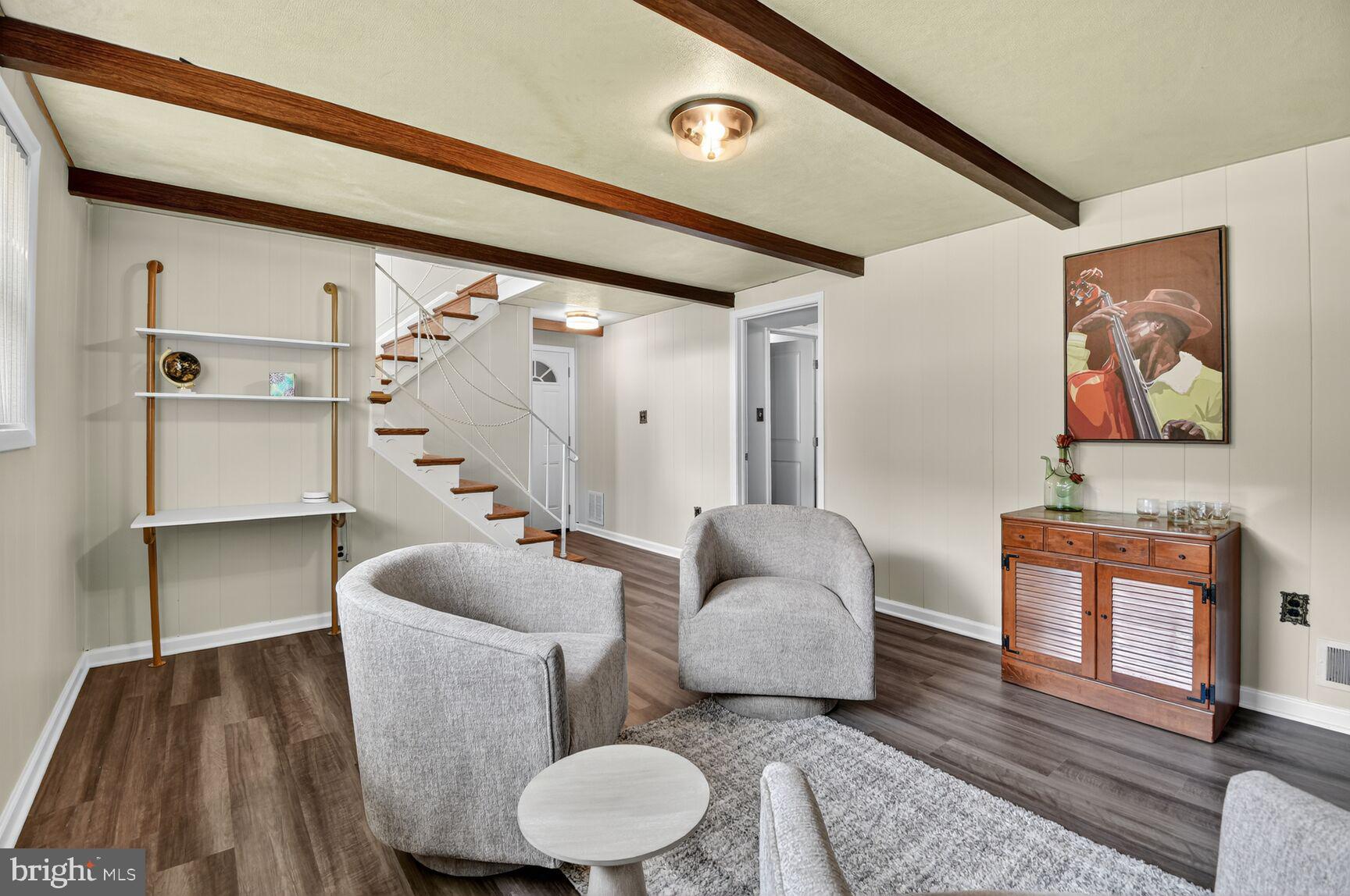 6801 Trowbridge Place Fort Washington, MD 20744 - Photo 19 of 30 a living room with furniture and wooden floor