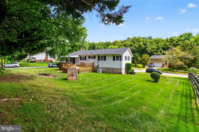 a view of a house with a big yard