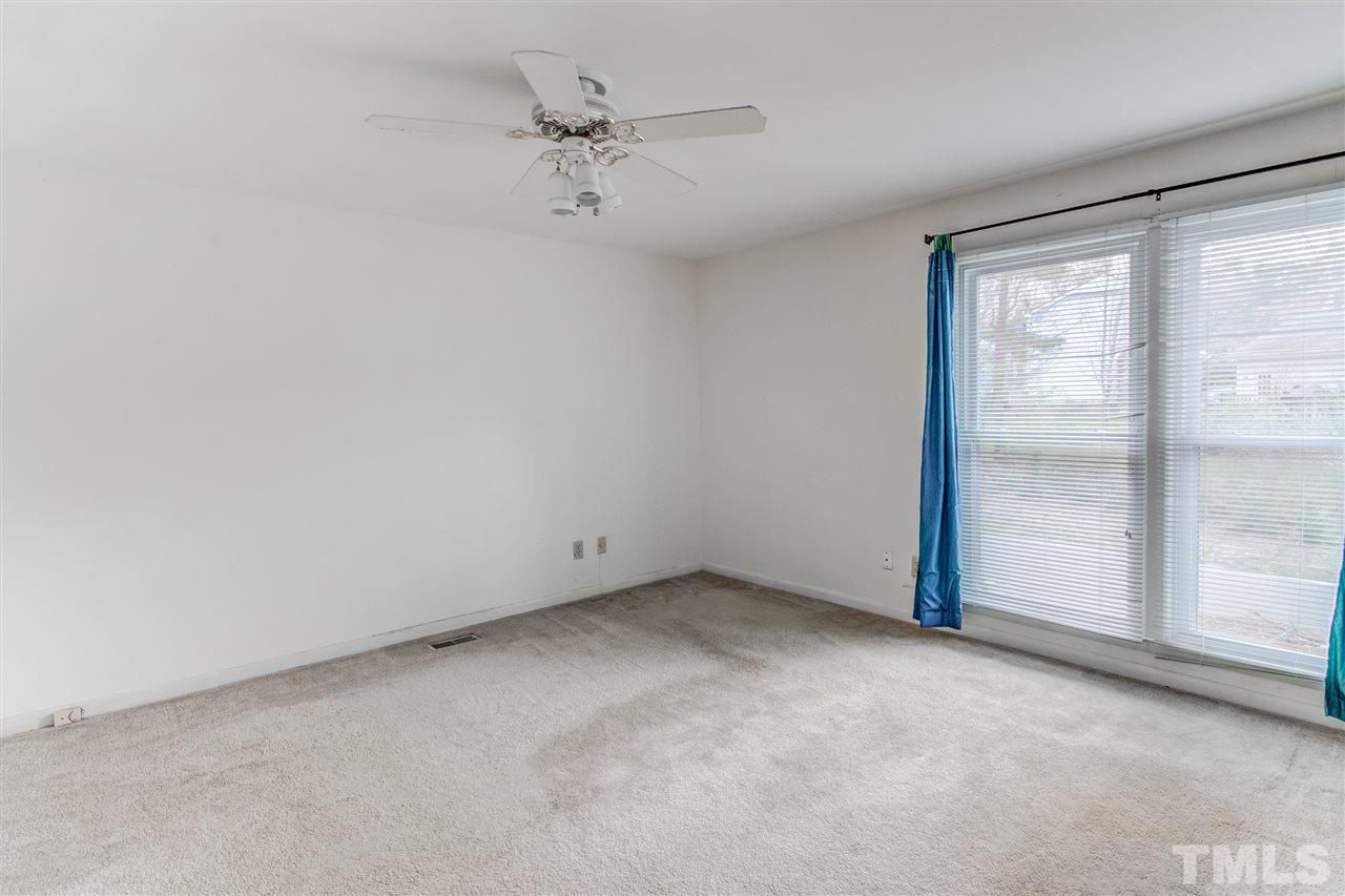 5705 Calorie Court Raleigh, NC 27612 - Photo 14 of 24 a view of an empty room with a window