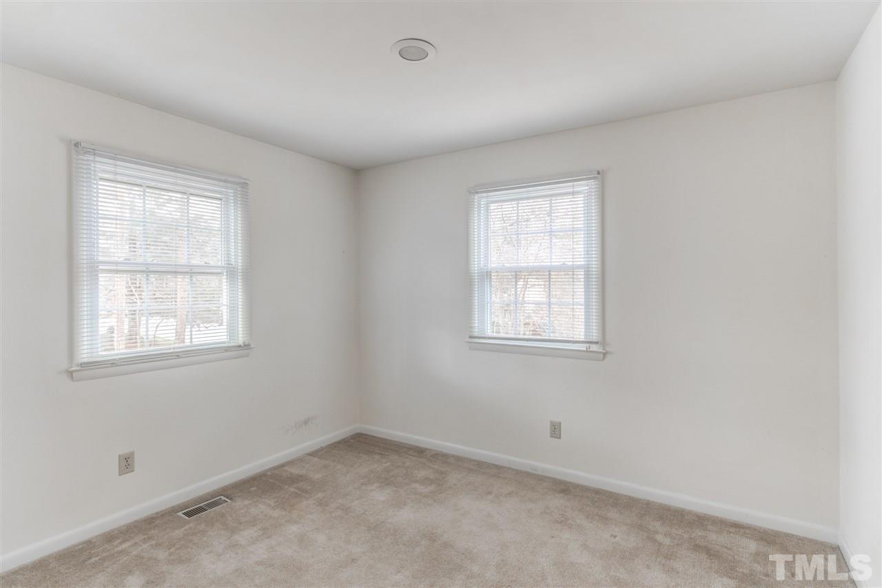 5705 Calorie Court Raleigh, NC 27612 - Photo 16 of 24 an empty room with a window