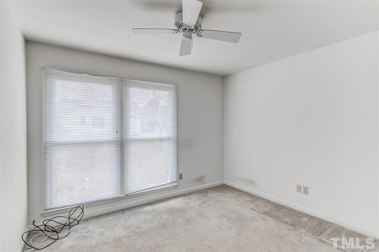 5705 Calorie Court Raleigh, NC 27612 - Photo 18 of 24 an empty room with windows