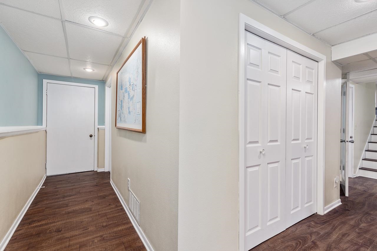 10388 Telegraph Road Winnebago, IL 61088 - Photo 24 of 48 a view of a hallway with wooden floor