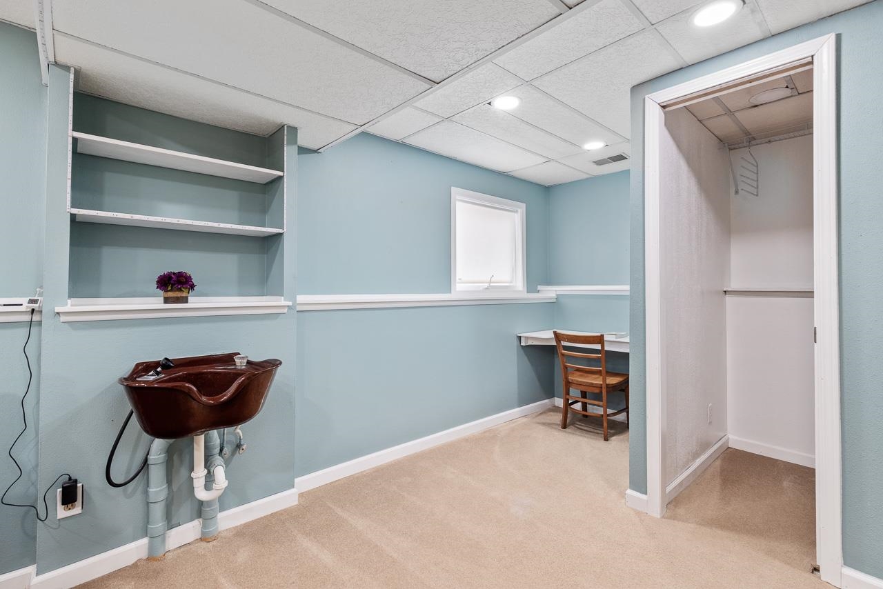 10388 Telegraph Road Winnebago, IL 61088 - Photo 28 of 48 a room with furniture and a chair