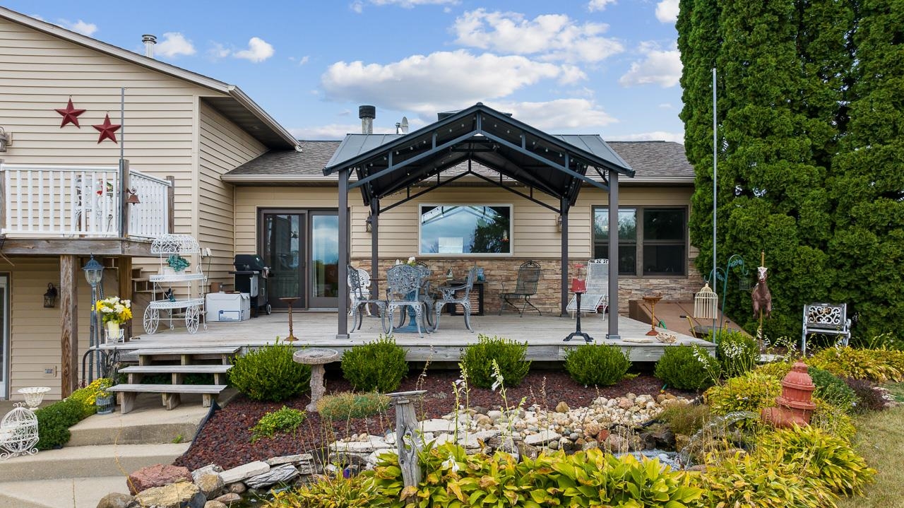 10388 Telegraph Road Winnebago, IL 61088 - Photo 34 of 48 a front view of a house with patio