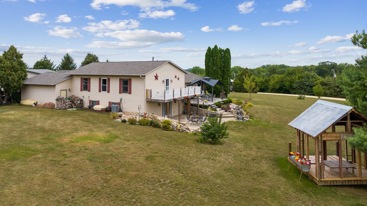 10388 Telegraph Road Winnebago, IL 61088 - Photo 41 of 48 a view of a house with pool table and chairs