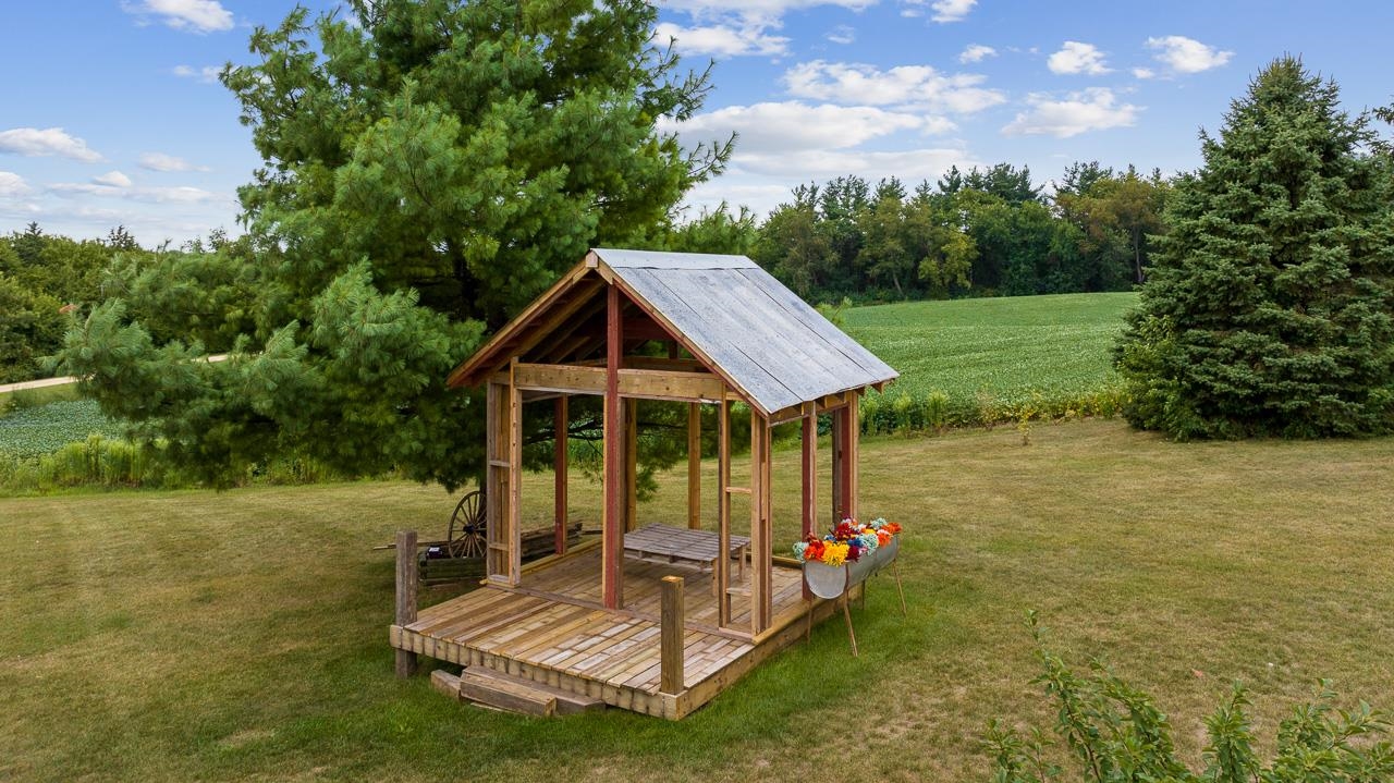 10388 Telegraph Road Winnebago, IL 61088 - Photo 42 of 48 a view of a house with backyard