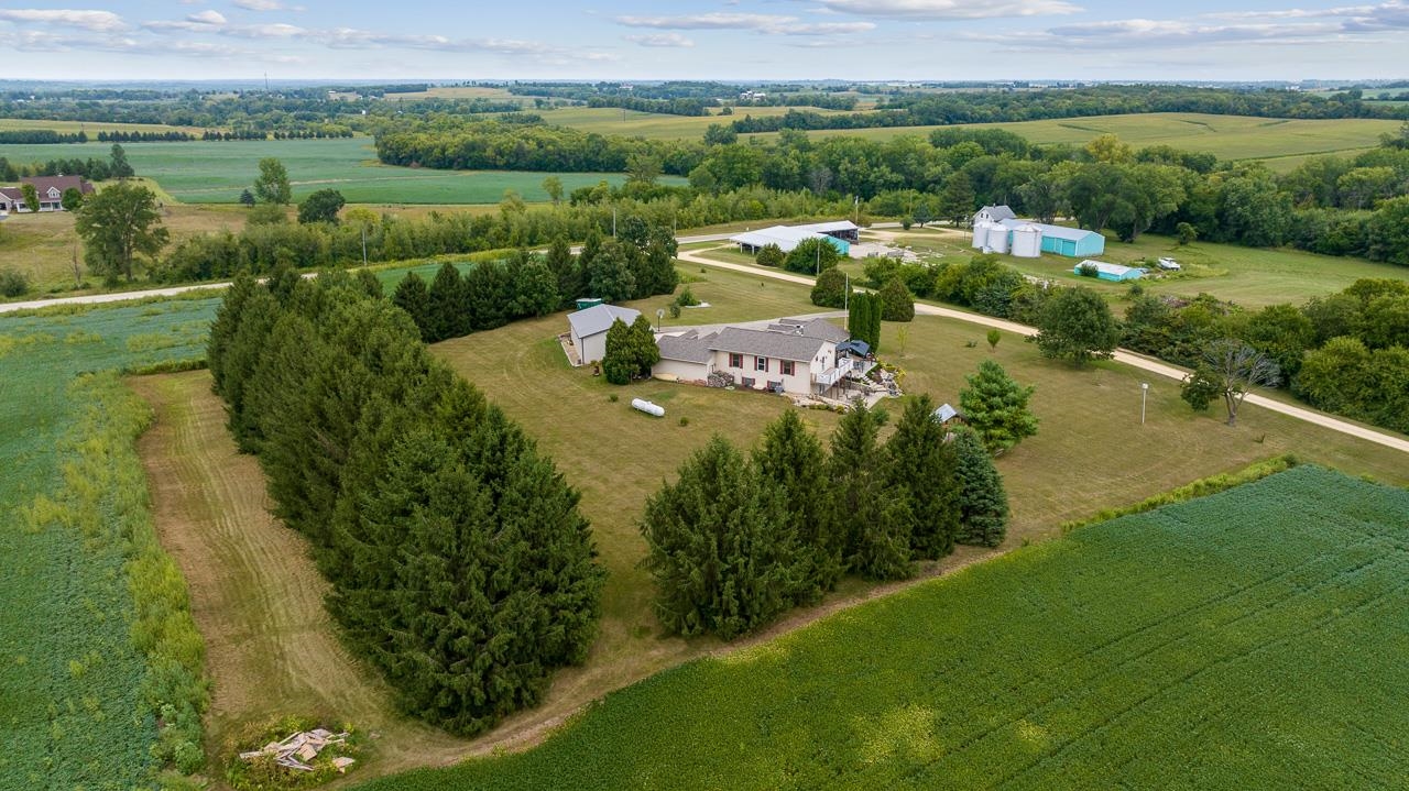 10388 Telegraph Road Winnebago, IL 61088 - Photo 46 of 48 a view of a lake with a yard