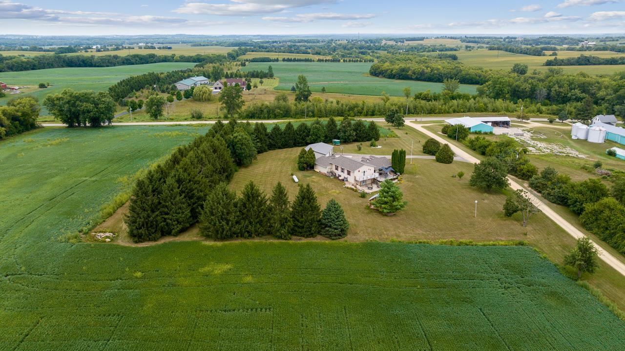 10388 Telegraph Road Winnebago, IL 61088 - Photo 47 of 48 an aerial view of a houses with outdoor space and mountain view