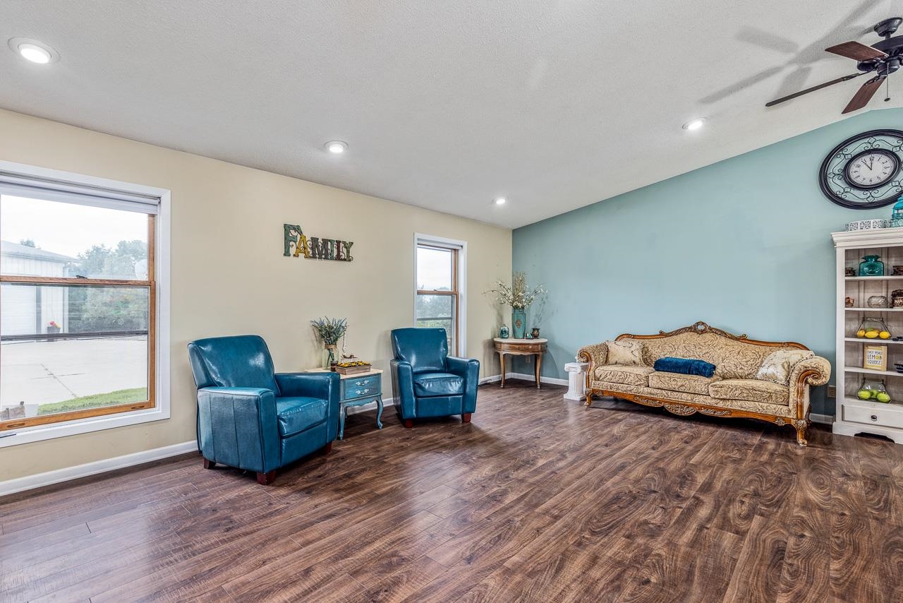 10388 Telegraph Road Winnebago, IL 61088 - Photo 7 of 48 a living room with furniture and a window