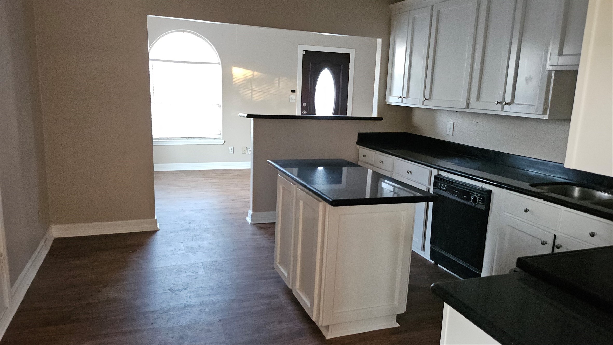 4714 Sharon Street Houston, TX 77020 - Photo 5 of 14 a kitchen with granite countertop a stove and a sink