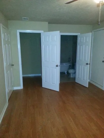 a view of a room that has a small yard