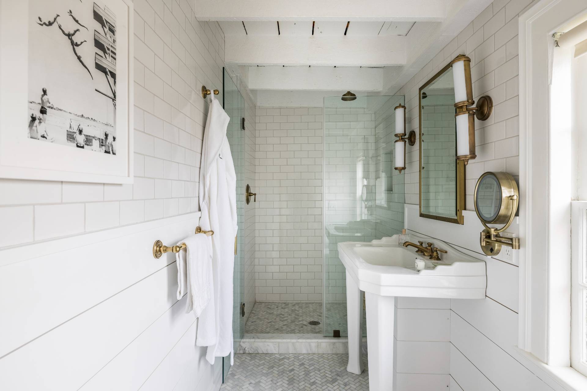 330 Main Street Sag Harbor, NY 11963 - Photo 25 of 32 a bathroom with a shower sink and mirror