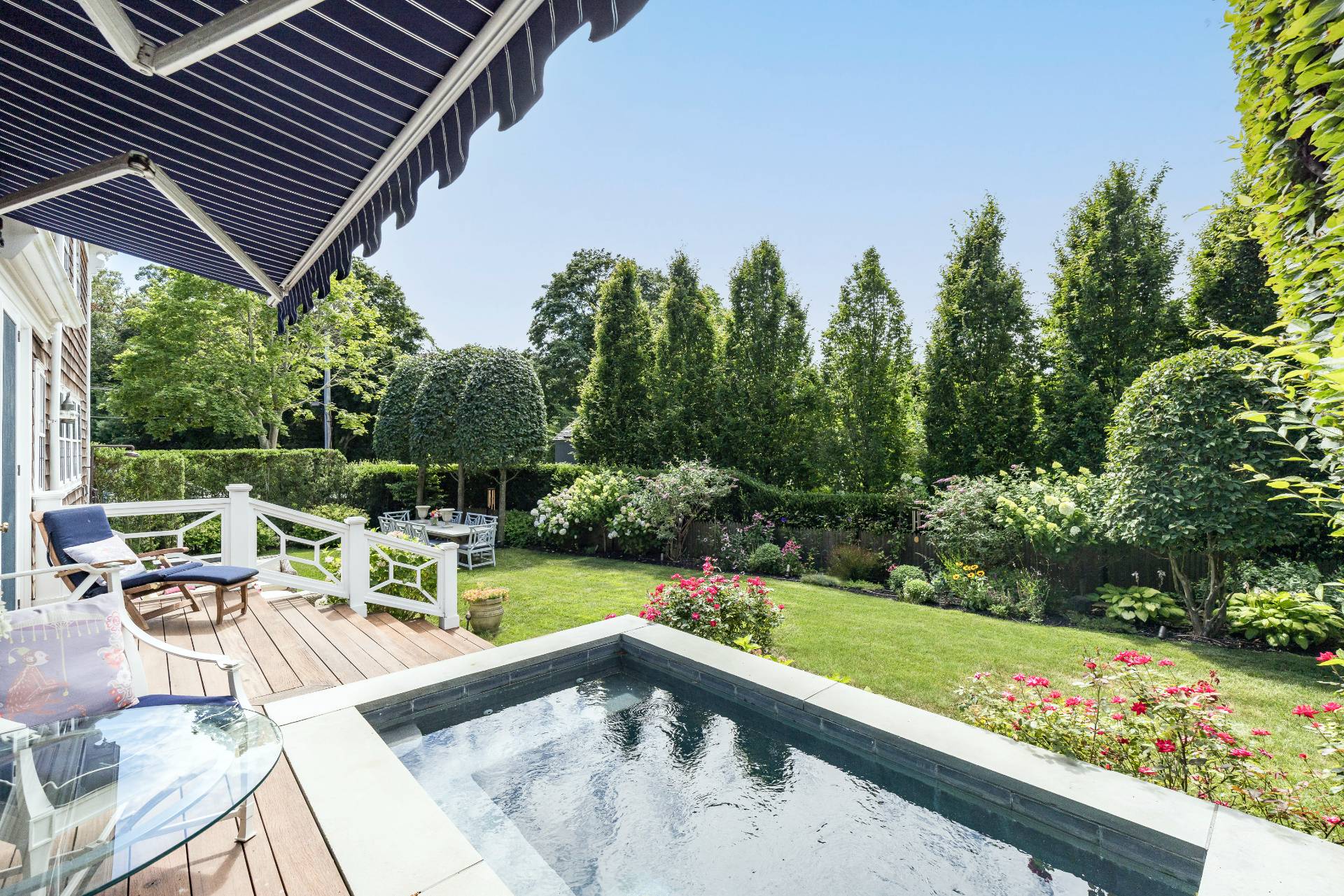 330 Main Street Sag Harbor, NY 11963 - Photo 4 of 32 a view of a swimming pool with a patio