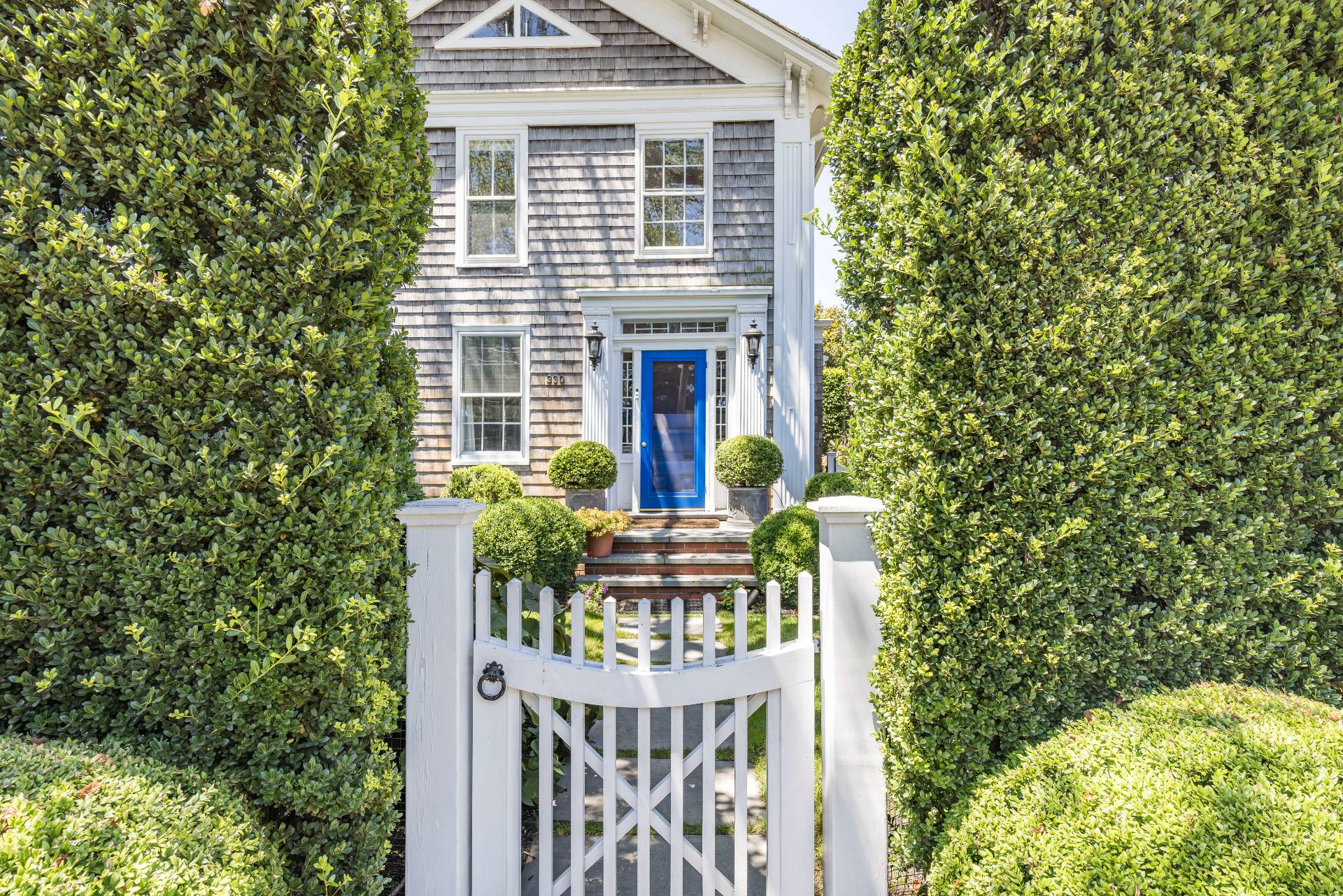 330 Main Street Sag Harbor, NY 11963 - Photo 5 of 32 a front view of house with yard outdoor seating and green space