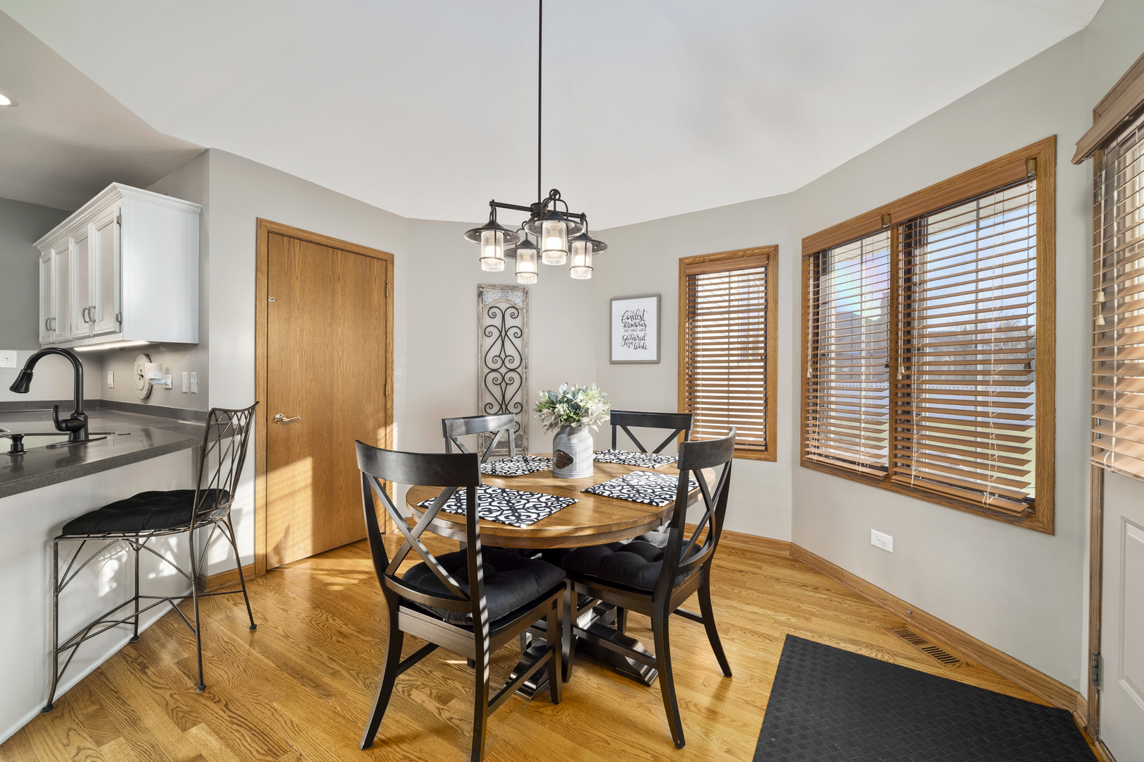 21181 Deerpath Road Frankfort, IL 60423 - Photo 13 of 25 a view of a dining room with furniture and a chandelier