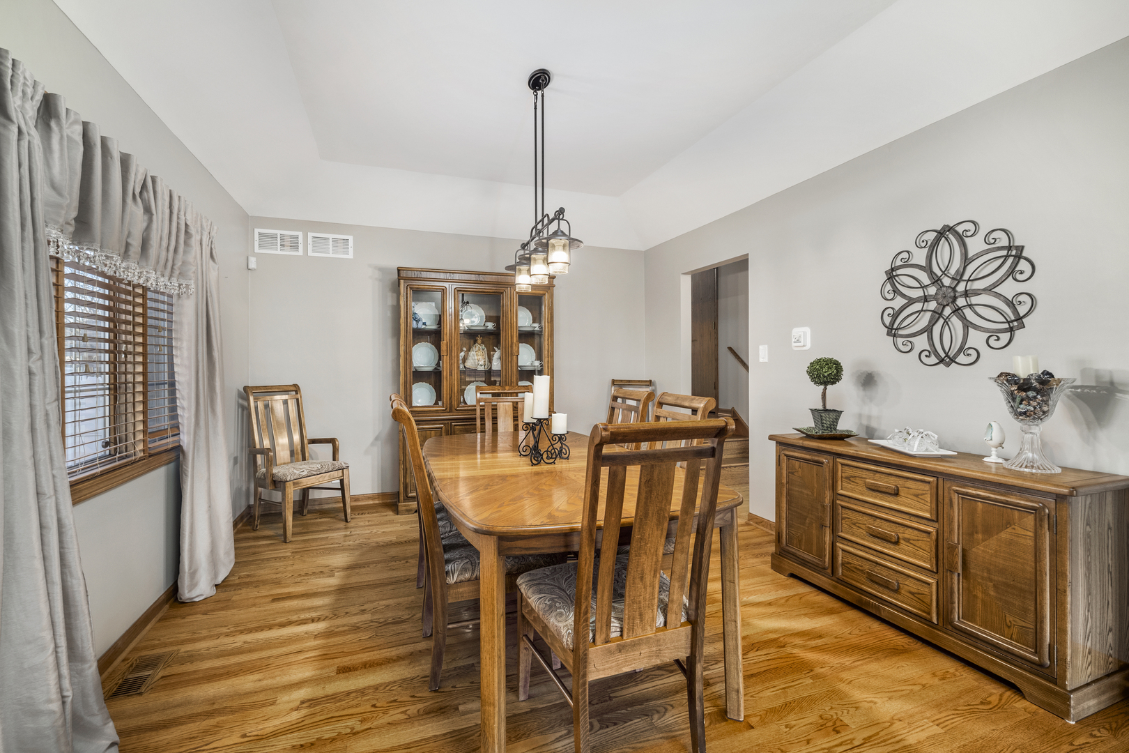 21181 Deerpath Road Frankfort, IL 60423 - Photo 6 of 25 a view of a dining room with furniture window and wooden floor