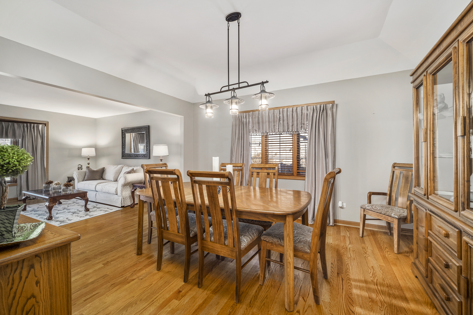 21181 Deerpath Road Frankfort, IL 60423 - Photo 7 of 25 a view of a dining room with furniture and wooden floor