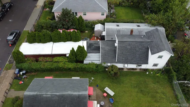 an aerial view of a house with a garden