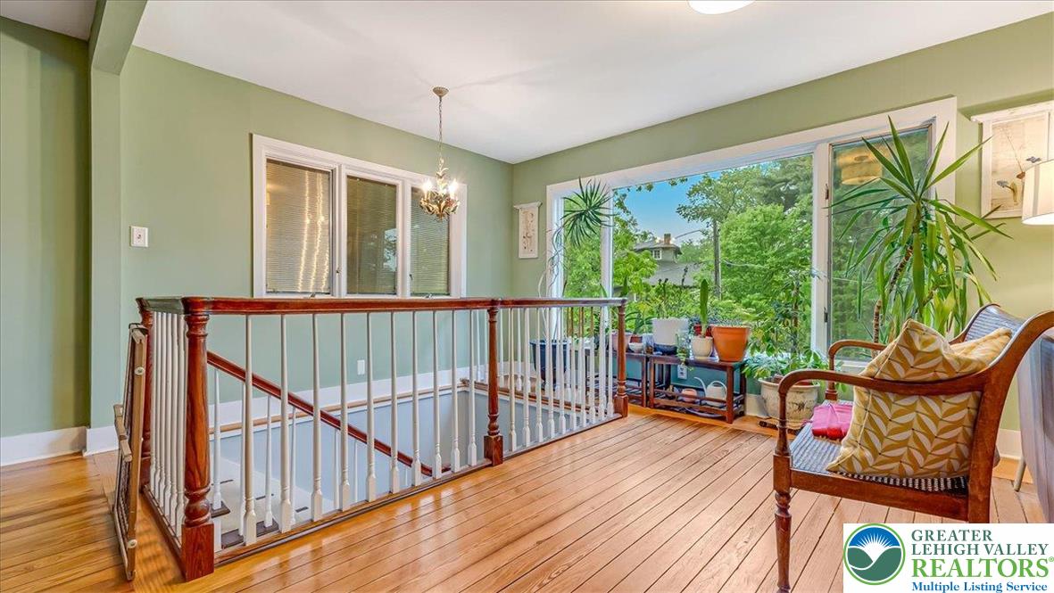119 Falls Drive Cresco, PA 18326 - Photo 19 of 56 a balcony with furniture and wooden floor