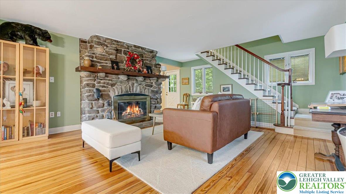 119 Falls Drive Cresco, PA 18326 - Photo 24 of 56 a living room with furniture and a fireplace
