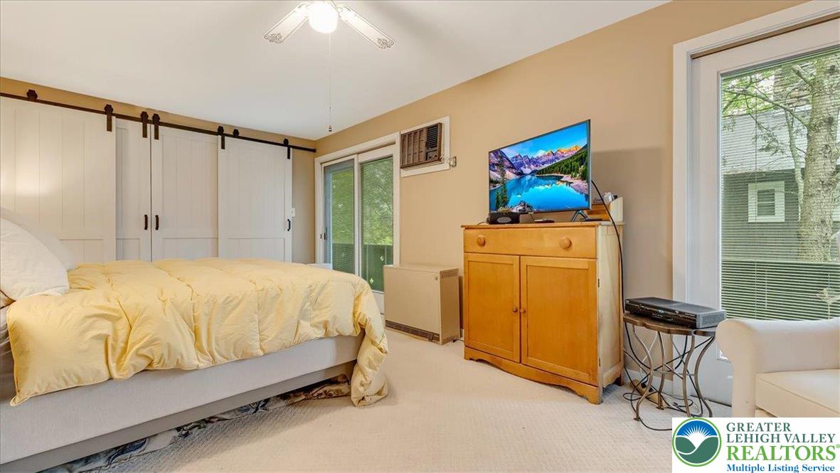 119 Falls Drive Cresco, PA 18326 - Photo 35 of 56 a bedroom with a bed and a window