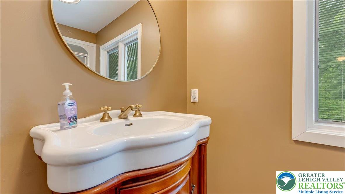 119 Falls Drive Cresco, PA 18326 - Photo 38 of 56 a bathroom with a sink and a mirror